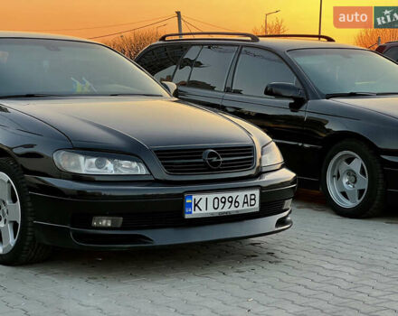 Чорний Опель Омега, об'ємом двигуна 2.2 л та пробігом 335 тис. км за 4000 $, фото 5 на Automoto.ua