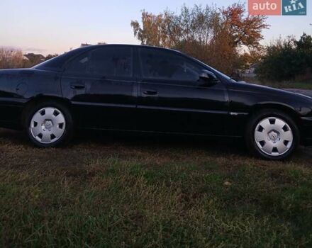 Опель Омега 2003 в Черкассах на Automoto.ua Черный Опель Омега, объемом двигателя 2.17 л и пробегом 273 тыс. км за 4200 $, фото 8 на Automoto.ua