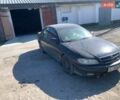 Черный Опель Омега, объемом двигателя 2.2 л и пробегом 434 тыс. км за 1600 $, фото 1 на Automoto.ua