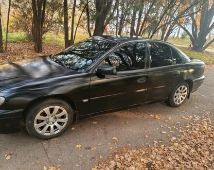 Черный Опель Омега, объемом двигателя 2.6 л и пробегом 350 тыс. км за 3700 $, фото 2 на Automoto.ua