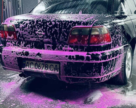 Черный Опель Омега, объемом двигателя 2.2 л и пробегом 474 тыс. км за 750 $, фото 2 на Automoto.ua