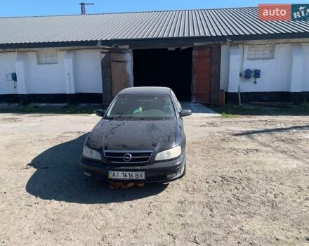 Черный Опель Омега, объемом двигателя 2.2 л и пробегом 434 тыс. км за 1600 $, фото 10 на Automoto.ua
