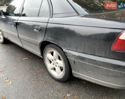 Опель Омега 2003 в Каменце-Подольском на Automoto.ua Черный Опель Омега, объемом двигателя 2.2 л и пробегом 220 тыс. км за 2500 $, фото 4 на Automoto.ua