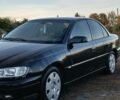 Опель Омега 2003 в Черкассах на Automoto.ua Черный Опель Омега, объемом двигателя 2.17 л и пробегом 273 тыс. км за 4200 $, фото 3 на Automoto.ua