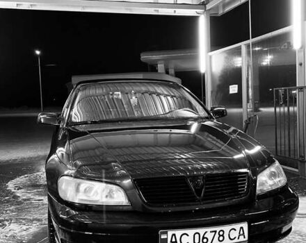 Черный Опель Омега, объемом двигателя 2.2 л и пробегом 474 тыс. км за 750 $, фото 1 на Automoto.ua