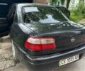 Черный Опель Омега, объемом двигателя 2.2 л и пробегом 333 тыс. км за 1900 $, фото 1 на Automoto.ua