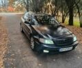 Черный Опель Омега, объемом двигателя 2.6 л и пробегом 350 тыс. км за 3300 $, фото 1 на Automoto.ua