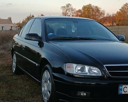 Опель Омега 2003 в Черкассах на Automoto.ua Черный Опель Омега, объемом двигателя 2.17 л и пробегом 273 тыс. км за 4200 $, фото 4 на Automoto.ua