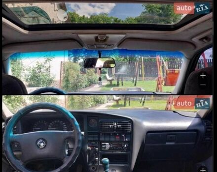 Чорний Опель Омега, об'ємом двигуна 2 л та пробігом 100 тис. км за 2000 $, фото 1 на Automoto.ua