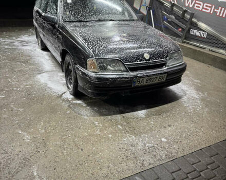 Чорний Опель Омега, об'ємом двигуна 2 л та пробігом 222 тис. км за 999 $, фото 4 на Automoto.ua