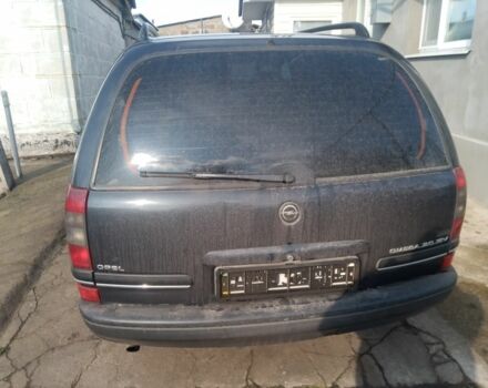 Черный Опель Омега, объемом двигателя 2 л и пробегом 140 тыс. км за 2500 $, фото 3 на Automoto.ua