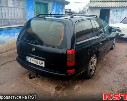 Черный Опель Омега, объемом двигателя 2.5 л и пробегом 181 тыс. км за 1200 $, фото 2 на Automoto.ua