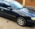Черный Опель Омега, объемом двигателя 2.5 л и пробегом 320 тыс. км за 1500 $, фото 6 на Automoto.ua
