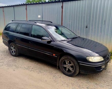 Чорний Опель Омега, об'ємом двигуна 2 л та пробігом 303 тис. км за 2500 $, фото 1 на Automoto.ua