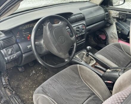 Черный Опель Омега, объемом двигателя 2.5 л и пробегом 1 тыс. км за 814 $, фото 7 на Automoto.ua