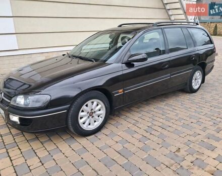 Чорний Опель Омега, об'ємом двигуна 2 л та пробігом 280 тис. км за 2500 $, фото 53 на Automoto.ua