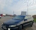 Черный Опель Омега, объемом двигателя 2 л и пробегом 284 тыс. км за 1600 $, фото 7 на Automoto.ua