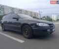 Чорний Опель Омега, об'ємом двигуна 2 л та пробігом 300 тис. км за 1550 $, фото 1 на Automoto.ua