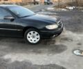 Черный Опель Омега, объемом двигателя 2.2 л и пробегом 350 тыс. км за 3400 $, фото 4 на Automoto.ua