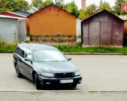 Черный Опель Омега, объемом двигателя 2.2 л и пробегом 220 тыс. км за 3000 $, фото 2 на Automoto.ua