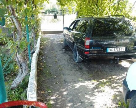 Черный Опель Омега, объемом двигателя 2.2 л и пробегом 220 тыс. км за 3300 $, фото 8 на Automoto.ua