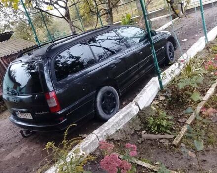 Черный Опель Омега, объемом двигателя 2.2 л и пробегом 220 тыс. км за 3000 $, фото 5 на Automoto.ua