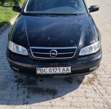 Черный Опель Омега, объемом двигателя 2.2 л и пробегом 175 тыс. км за 1500 $, фото 5 на Automoto.ua