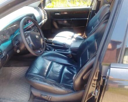 Черный Опель Омега, объемом двигателя 2.2 л и пробегом 220 тыс. км за 3000 $, фото 3 на Automoto.ua