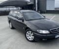 Черный Опель Омега, объемом двигателя 2.2 л и пробегом 250 тыс. км за 3300 $, фото 1 на Automoto.ua