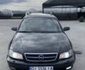 Черный Опель Омега, объемом двигателя 2.2 л и пробегом 250 тыс. км за 3300 $, фото 2 на Automoto.ua