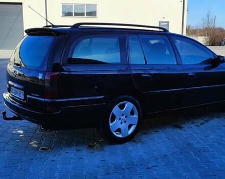 Черный Опель Омега, объемом двигателя 2.5 л и пробегом 288 тыс. км за 4800 $, фото 3 на Automoto.ua