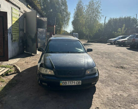 Черный Опель Омега, объемом двигателя 2.5 л и пробегом 350 тыс. км за 3500 $, фото 4 на Automoto.ua