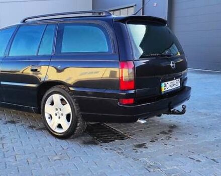 Черный Опель Омега, объемом двигателя 2.5 л и пробегом 288 тыс. км за 4800 $, фото 7 на Automoto.ua