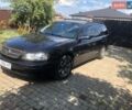 Черный Опель Омега, объемом двигателя 2.2 л и пробегом 395 тыс. км за 3400 $, фото 1 на Automoto.ua