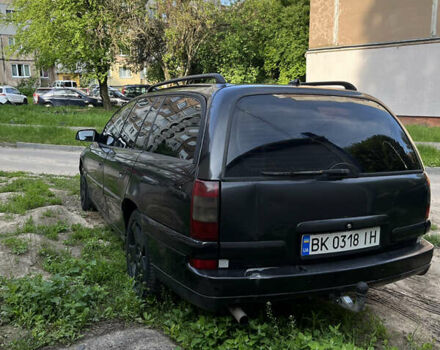 Черный Опель Омега, объемом двигателя 2.5 л и пробегом 383 тыс. км за 2800 $, фото 5 на Automoto.ua