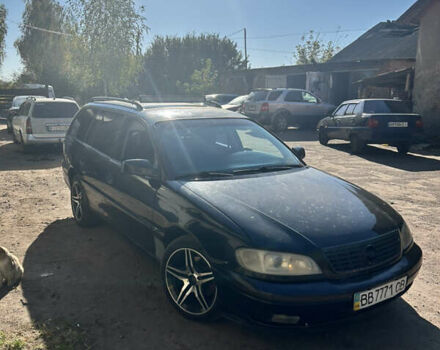 Черный Опель Омега, объемом двигателя 2.5 л и пробегом 350 тыс. км за 3500 $, фото 3 на Automoto.ua