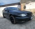 Черный Опель Омега, объемом двигателя 2.2 л и пробегом 260 тыс. км за 3100 $, фото 1 на Automoto.ua