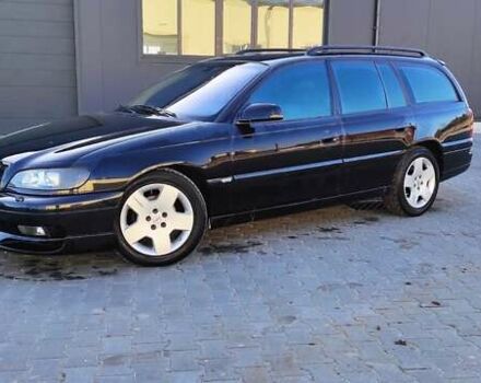 Черный Опель Омега, объемом двигателя 2.5 л и пробегом 288 тыс. км за 4800 $, фото 2 на Automoto.ua