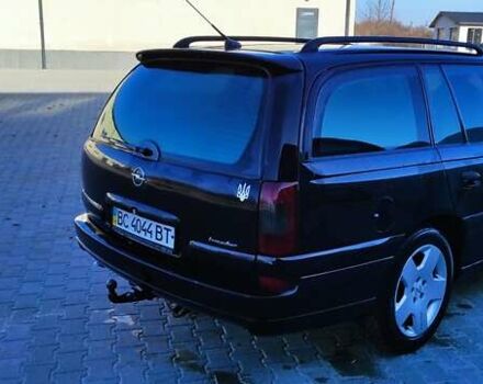 Черный Опель Омега, объемом двигателя 2.5 л и пробегом 288 тыс. км за 4800 $, фото 5 на Automoto.ua