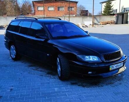 Черный Опель Омега, объемом двигателя 2.5 л и пробегом 288 тыс. км за 4800 $, фото 4 на Automoto.ua