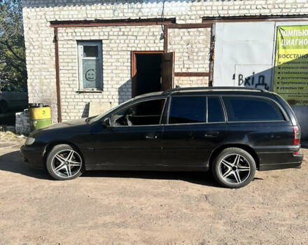 Черный Опель Омега, объемом двигателя 2.5 л и пробегом 350 тыс. км за 3500 $, фото 5 на Automoto.ua
