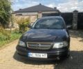 Черный Опель Омега, объемом двигателя 2.2 л и пробегом 395 тыс. км за 3400 $, фото 1 на Automoto.ua
