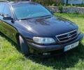 Черный Опель Омега, объемом двигателя 2.2 л и пробегом 330 тыс. км за 4000 $, фото 2 на Automoto.ua