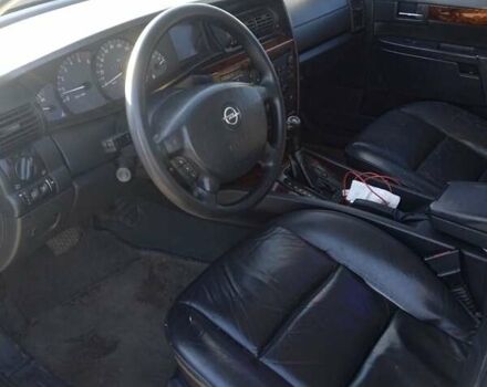 Черный Опель Омега, объемом двигателя 2.5 л и пробегом 334 тыс. км за 4200 $, фото 15 на Automoto.ua