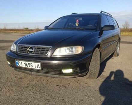 Черный Опель Омега, объемом двигателя 2.5 л и пробегом 334 тыс. км за 4200 $, фото 12 на Automoto.ua
