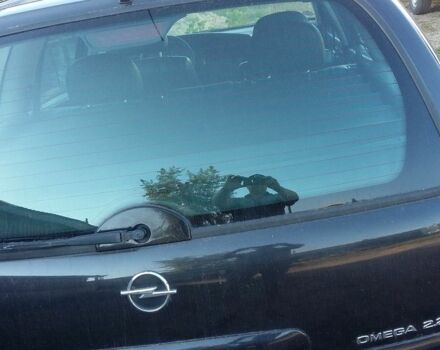 Опель Омега 2003 в Нововолынск на Automoto.ua Черный Опель Омега, объемом двигателя 2.2 л и пробегом 30 тыс. км за 1600 $, фото 1 на Automoto.ua