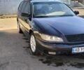 Черный Опель Омега, объемом двигателя 2.2 л и пробегом 290 тыс. км за 2499 $, фото 1 на Automoto.ua