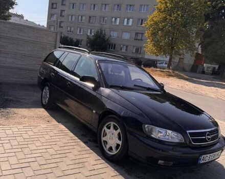 Черный Опель Омега, объемом двигателя 2.2 л и пробегом 330 тыс. км за 3500 $, фото 3 на Automoto.ua