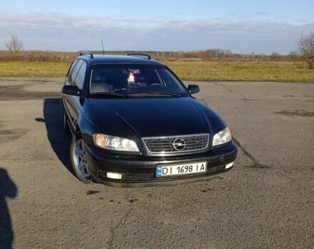 Черный Опель Омега, объемом двигателя 2.5 л и пробегом 334 тыс. км за 4200 $, фото 4 на Automoto.ua