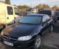Черный Опель Омега, объемом двигателя 2.5 л и пробегом 548 тыс. км за 1000 $, фото 1 на Automoto.ua